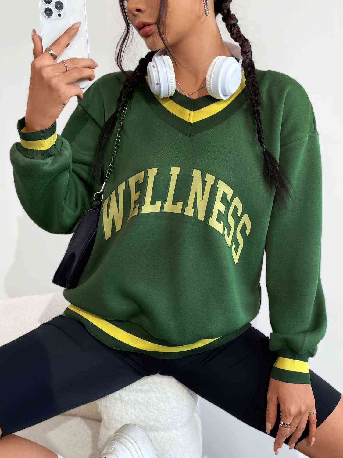 WELLNESS Graphic V-Neck Sweatshirt